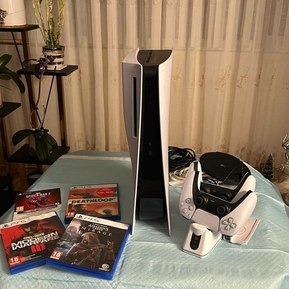Sony PS5 ; white  color used only once for 2 hours ,high memory w/disc option …